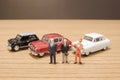 the min figures of a people and car Royalty Free Stock Photo