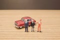 the min figures of a people and car Royalty Free Stock Photo