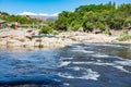 Extraordinary nature of the province of Cordoba Argentina in the city of Mina Clavero and people resting on the river