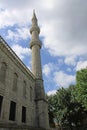 Minaret of The Blue Mosque Istanbul Turkey against a cloudy sky Royalty Free Stock Photo