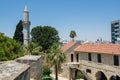 Minaret of Buyuk or Kebir Mosque and  Medieval castle in the Larnaca Fort in Cyprus Royalty Free Stock Photo