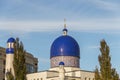 Minaret and dome with the moon in the Imangali mosque in the city of Atyrau