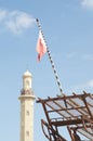 Minaret and flag Royalty Free Stock Photo