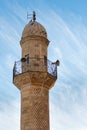 Minaret of a historical mosque in mardin turkey and blue sky Royalty Free Stock Photo