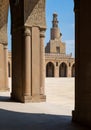 Minaret of Ibn Tulun public historical mosque framed decorated arch, Cairo, Egypt Royalty Free Stock Photo