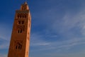 Minaret of Koutubia mosque against blue sky at sunset. Marrakech, Morocco. Royalty Free Stock Photo