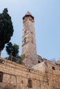 Minaret of the Mosque Omar next to the courtyard of the Church of the Holy Sepulchre in the old city of Jerusalem, Israel.