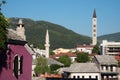 Minaret And Bell Tower In Mostar, Bosnia And Herzegovina Royalty Free Stock Photo