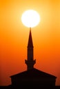 Minaret with sun in the morning a view from Busiateen coast, Bahrain Royalty Free Stock Photo