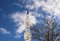 Minaret mosque with blue background