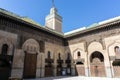 FES, MOROCCO - March 4, 2020: The minaret view and Inside interior of The Madrasa Bou Inania Medersa el Bouanania .