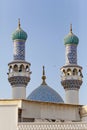 Minarets and dome of the mosque against blue skies Royalty Free Stock Photo