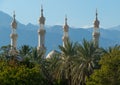 Minarets muslim mosque on a background of mountains. Royalty Free Stock Photo