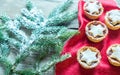 Mince pies with Christmas tree branch Royalty Free Stock Photo