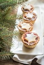 Mince pies with Christmas tree branch Royalty Free Stock Photo