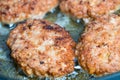 Minced cutlets are fried in a pan in boiling oil. Royalty Free Stock Photo