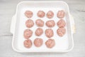 Minced meat balls in a baking dish Royalty Free Stock Photo