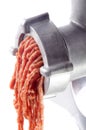 Minced meat comes fresh from a mincer
