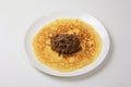 Minced meat filling on a large thin pancake