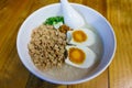 Minced pork congee with egg, fresh ginger Royalty Free Stock Photo