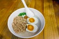 Minced pork congee with egg, fresh ginger Royalty Free Stock Photo