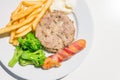 Minced Pork Steak, Sausage and bacon roll with French Fries Royalty Free Stock Photo