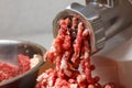 Mincer with fresh minced beef meat