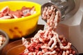 Mincer with fresh minced beef meat