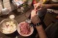 Mincer machine with fresh chopped meat at home kitchen. Preparing ground meat