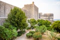 Minceta Tower and Dubrovnik medieval old town city walls at sunset time, Croatia Royalty Free Stock Photo