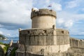 Minceta Tower at sanset lights and Dubrovnik medieval old town city walls, Croatia Royalty Free Stock Photo