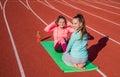 Mind and body in harmony. pilates. children training at school physical education lesson. teenage girls practicing yoga Royalty Free Stock Photo