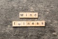 mind fulness word written on wood block. mind fulness text on table, concept