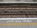 `Mind the gap` inscription on the street. London.