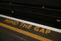 `Mind the Gap` Sign located in the London Underground Royalty Free Stock Photo