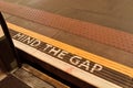 Mind the gap sign on underground platform. Royalty Free Stock Photo