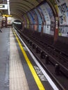 Mind the gap sign on a platform in London Underground Royalty Free Stock Photo