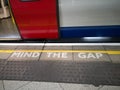 Mind The Gap Sign: Underground in Central London Royalty Free Stock Photo