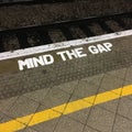 Mind The Gap in Yellow Letters at a Railway Station in Birmingham