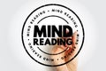 Mind Reading stamp held by hand shows psychology perception concept in bold typography inside circular seal composition isolated Royalty Free Stock Photo