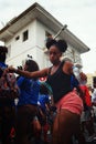 oung girl dances during the street carnival