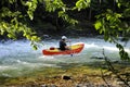 Unknown canoeist, whitewater canoeing at the Minden Wild Water Preserve. Royalty Free Stock Photo