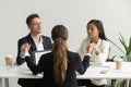 Mindful diverse team people holding hands meditating praying for Royalty Free Stock Photo