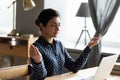 Mindful millennial hindu girl freelancer student reducing stress. Royalty Free Stock Photo