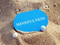 Mindfulness concept. Wooden plate on sand Royalty Free Stock Photo