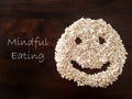 Mindfulness Eating concept using oat formed into a smiley face