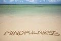 Mindfulness Written Text On Sand At Beach Royalty Free Stock Photo