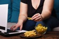 mindless snacking, overeating, lack of physical activity, lazine Royalty Free Stock Photo