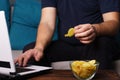 Mindless snacking, overeating, laziness, homebody Royalty Free Stock Photo