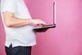 Lack of physical activity, fat man with laptop Royalty Free Stock Photo